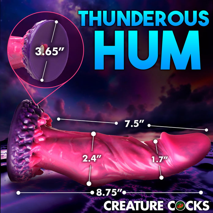 Alien-inspired vibrating dildo with remote control, premium silicone, suction cup base, and harness compatibility. Pink and purple design for fantasy play.