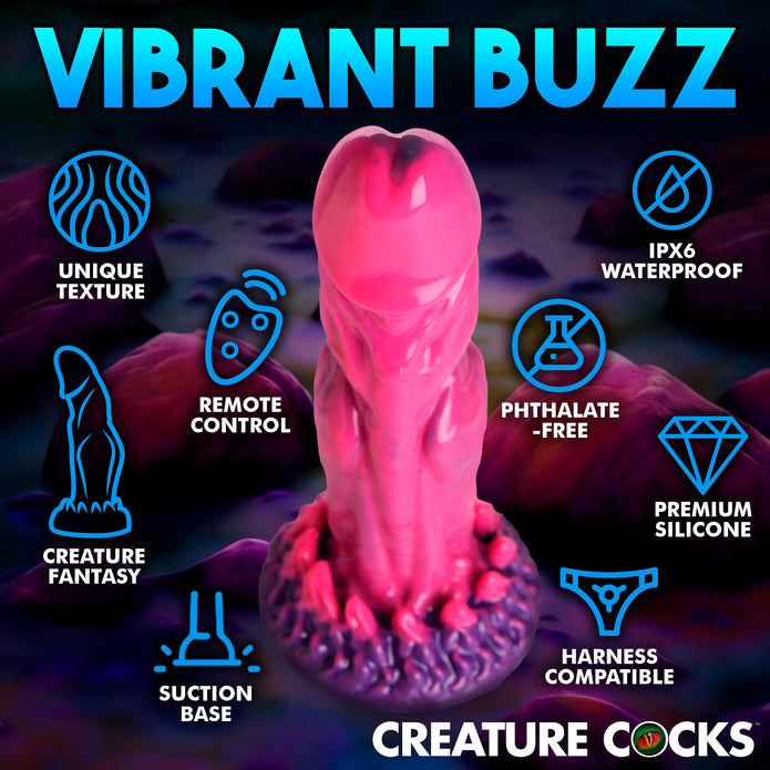 Alien-inspired vibrating dildo with remote control, premium silicone, suction cup base, and harness compatibility. Pink and purple design for fantasy play.