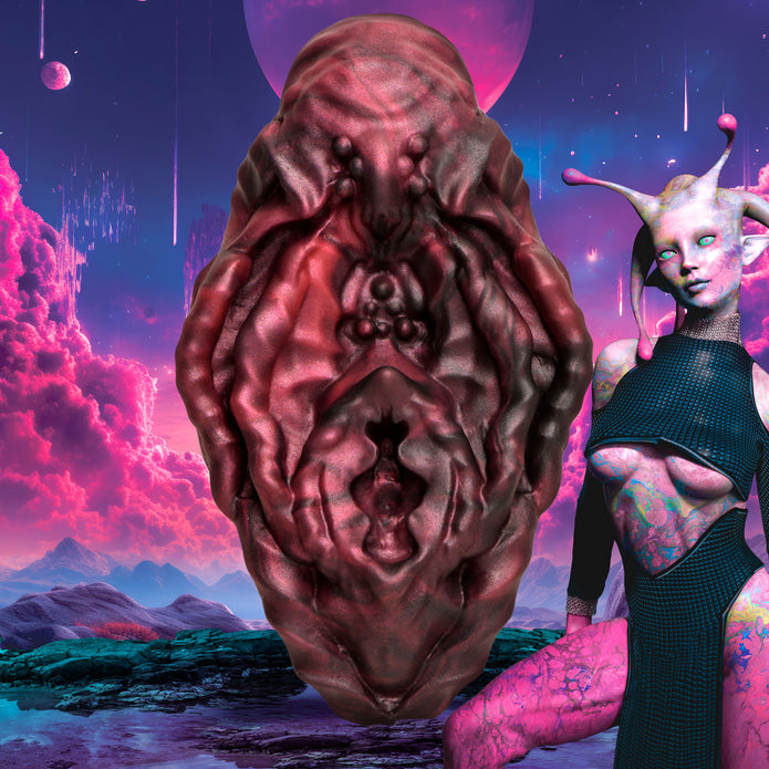 Squishy red and black alien vulva grinder with textured design for non-penetrative pleasure.
Xeno vulva, alien vulva grinder, non-penetrative pleasure, textured grinder, fantasy pleasure toy, red and black vulva, squishy silicone toy, body-safe silicone, phthalate-free grinder, erogenous zone toy, water-based lube friendly, alien roleplay toy