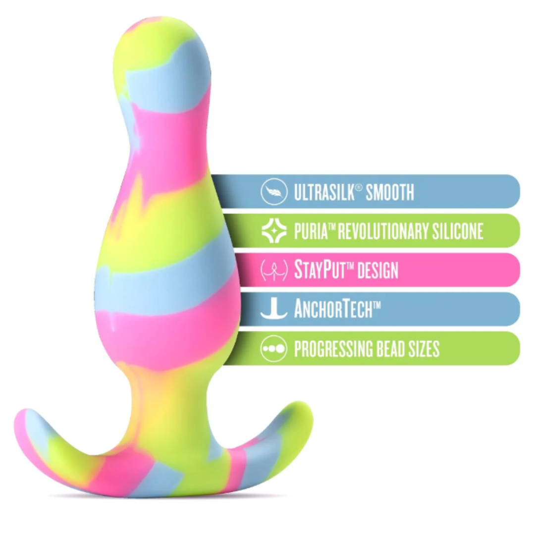 The Avant Kaleido Lime Butt Plug with feature labels, including Ultrasilk® smooth finish, Puria™ silicone, StayPut™ design, AnchorTech™ base, and progressing bead sizes for added sensation.