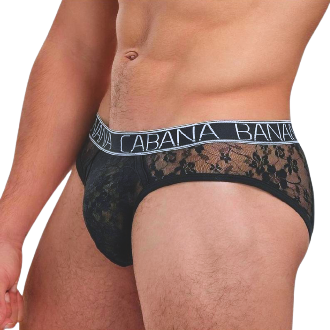 Low-rise men’s black lace briefs in S/M, M/L, and L/XL with a soft floral design, modesty panel in the front, sheer back, and crafted from a blend of Nylon and Elastane.