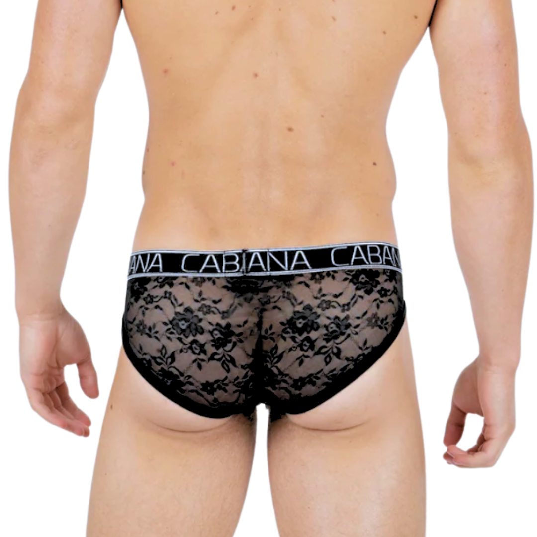 Low-rise men’s black lace briefs in S/M, M/L, and L/XL with a soft floral design, modesty panel in the front, sheer back, and crafted from a blend of Nylon and Elastane.