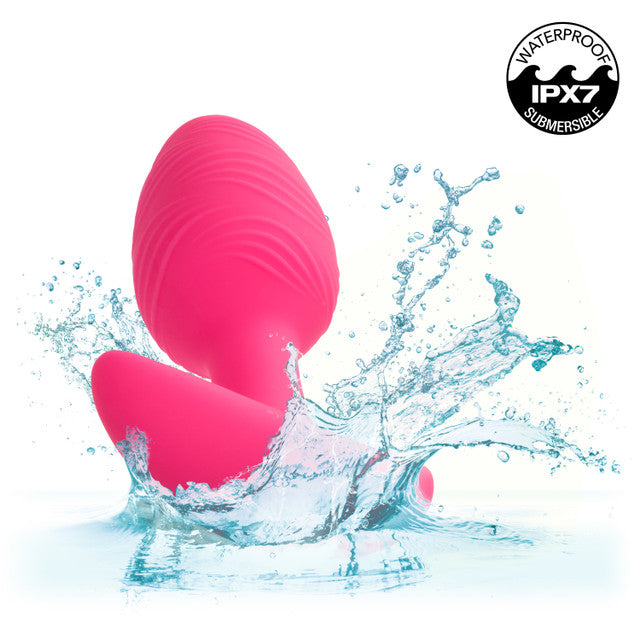 Cheeky Rechargeable Silicone Glow In The Dark Anal Butt Plug featuring 10 vibration speeds and a textured design for enhanced sensations. Waterproof (IPX7), USB rechargeable, and travel-friendly with a secure lock. Insertable length: 3.5 inches. Perfect for adventurous play!