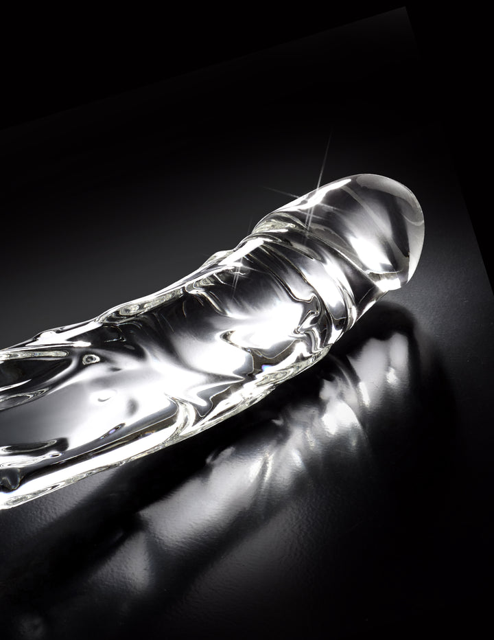 Elegant glass massager with a curved design, tapered tip, and harness-compatible base for G-Spot or P-Spot stimulation.
Icicles No. 62, glass massager, hypoallergenic glass toy, G-Spot stimulation wand, P-Spot glass toy, realistic glass dildo, temperature play toy, harness-compatible glass toy, dishwasher-safe glass massager, luxury glass wand.