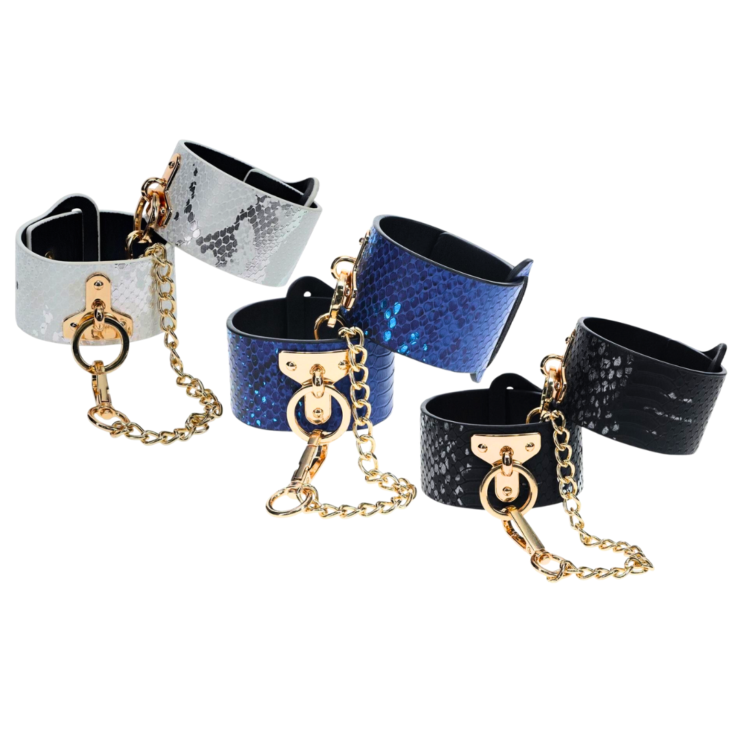 Florence Collection handcuffs by Ouch! crafted from bonded leather hand cuffs with iridescent hardware, combining high fashion and secure functionality.