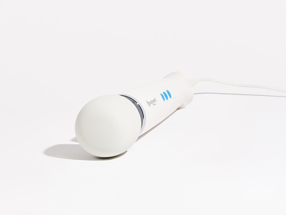 Magic Wand Plus Massager with four intensity levels, soft silicone head, flexible neck, and detachable cord for easy storage and reliable performance.
Magic Wand Plus, variable-speed massager, corded Magic Wand, deep rumbly vibrations, detachable cord massager, soft silicone massage wand, 6,300 RPM Magic Wand, authentic Magic Wand massager, Magic Wand for sore muscles, Magic Wand for intimate play.