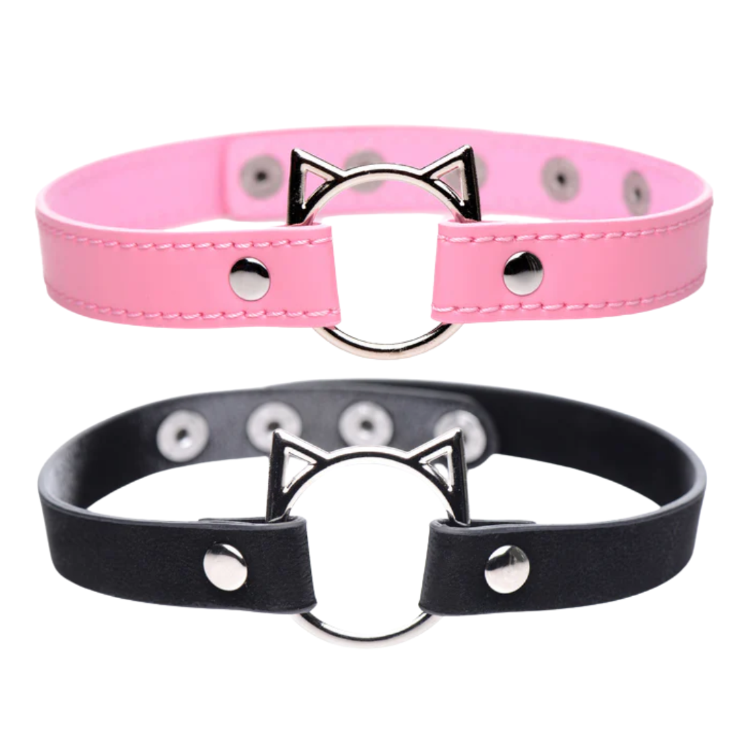 Kitty play choker in pink or black, with cat-shaped O-ring, adjustable snap buttons, and lightweight PU leather design for stylish, comfortable wear.