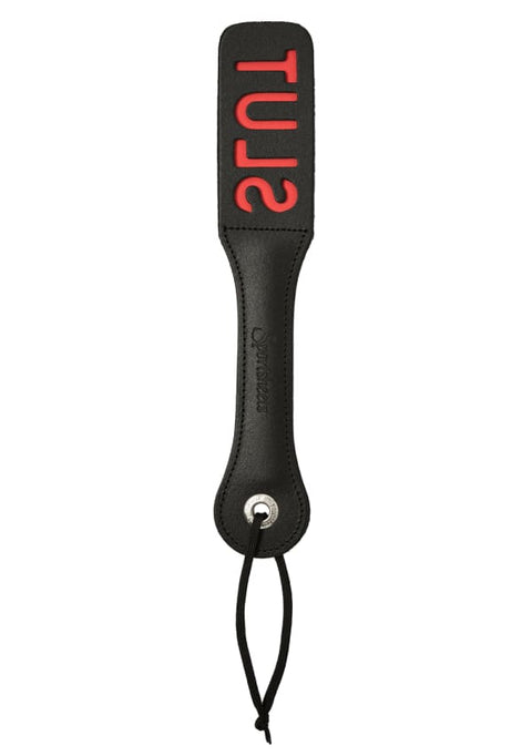 Leather paddle with "SLUT" cut-out, designed to imprint the word during impact play.
