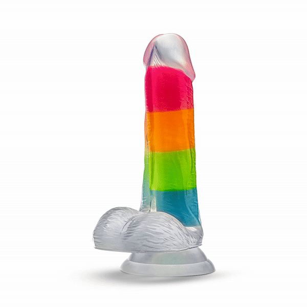 A vibrant glow-in-the-dark rainbow dildo with dual-density silicone, a suction cup base, and lifelike details. Perfect for hands-free or strap-on play. Keywords: Neo Elite Rainbow Rave, glow-in-the-dark dildo, rainbow dildo, Sensa Feel, dual-density silicone, Purio silicone, harness-compatible dildo, suction cup dildo, body-safe silicone, lifelike dildo, beginner-friendly toy