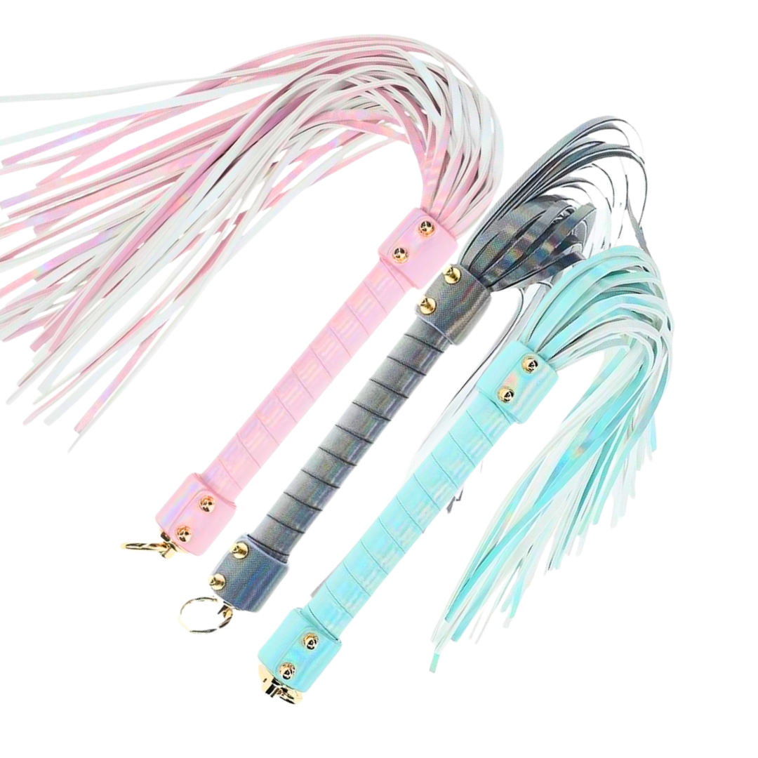 Paris Collection Flogger by Ouch! in blue, gray, and pink, featuring iridescent finishes, soft leather strands, and a sturdy handle for stylish and versatile BDSM play.