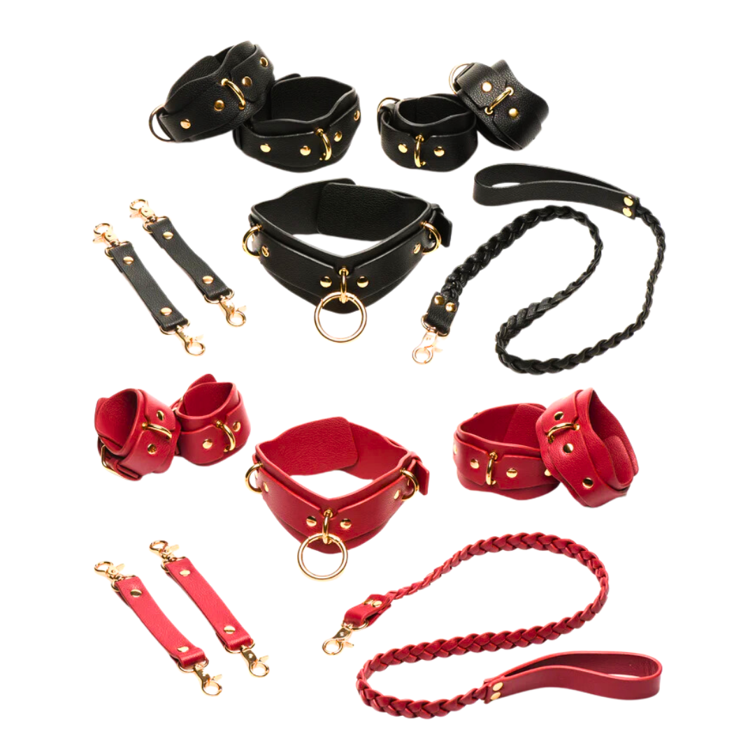 Vegan leather bondage set in black or red with gold accents. Includes cuffs, collar, leash, and connectors for versatile restraint play. Keywords: vegan leather bondage set, red and gold BDSM set, black and gold bondage set, adjustable BDSM cuffs, vegan leather collar, nickel-free bondage gear, braided leash BDSM, luxury bondage set, complete BDSM restraint kit, beginner-friendly bondage gear, stylish BDSM accessories.