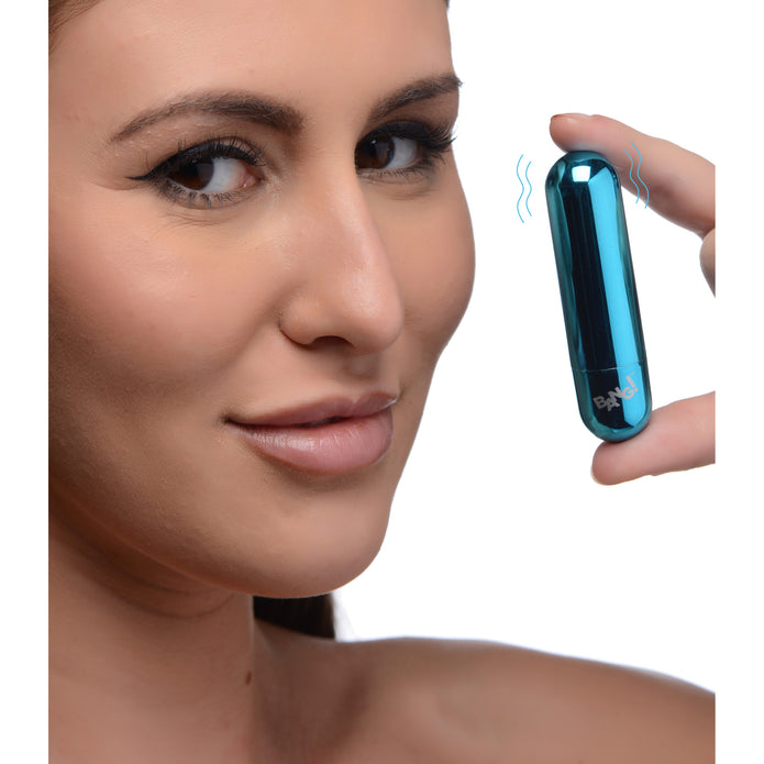 Compact bullet vibrator with 10 vibration patterns, metallic finish, USB rechargeable, waterproof, available in pink, black, purple, and blue.