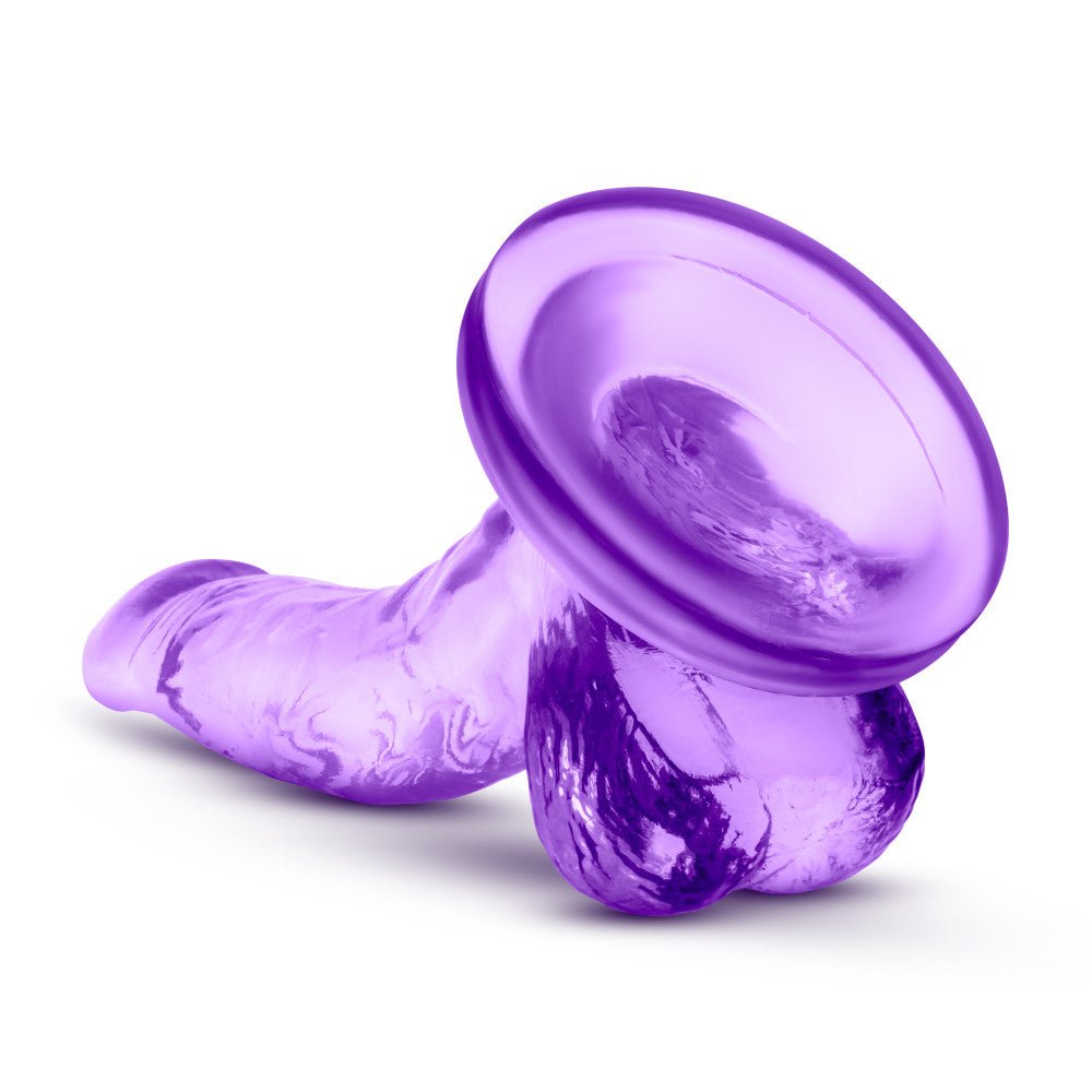Naturally Yours Mini Cock, lifelike dildo with curved shaft, suction cup base, and body-safe materials, available in pink or purple.
beginner dildo, lifelike dildo, pink dildo, purple dildo, G-spot stimulation, P-spot stimulation, pegging toy, harness-compatible dildo, suction cup dildo, body-safe TPE, beginner-friendly sex toy