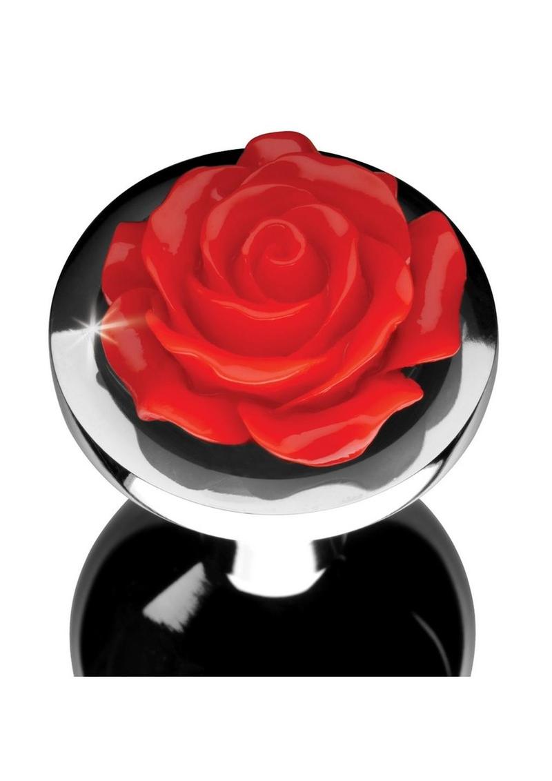 Red rose anal plug in nickel-free aluminum, available in Small or Medium sizes. Smooth, tapered, and temperature-sensitive for stylish and safe play.