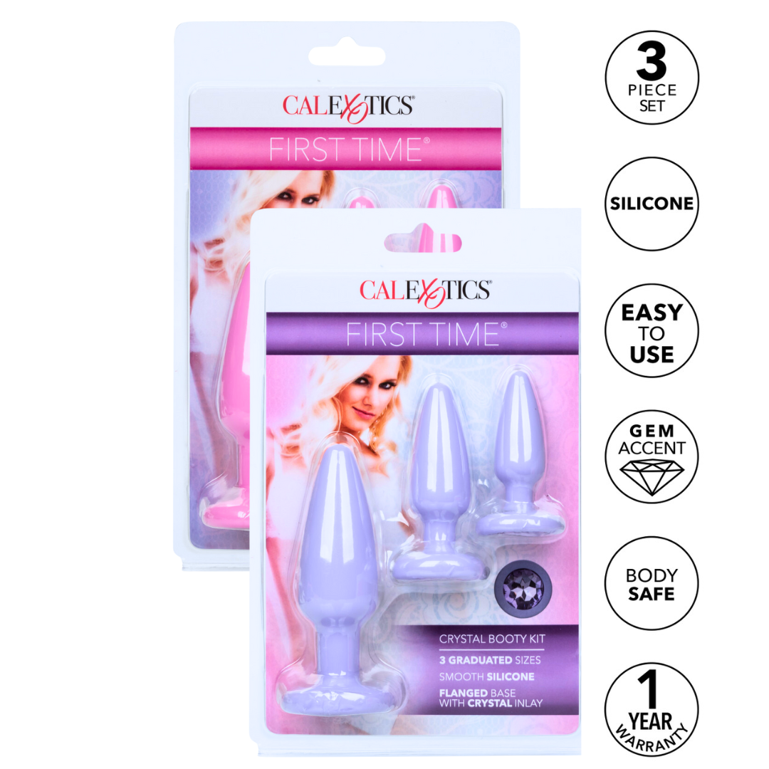 Packaging of the First Time® Crystal Booty Kit by CalExotics, featuring a 3-piece set of graduated silicone anal plugs with gem accents. The packaging highlights key features, including "3 Piece Set," "Silicone," "Easy to Use," "Gem Accent," "Body Safe," and "1 Year Warranty."