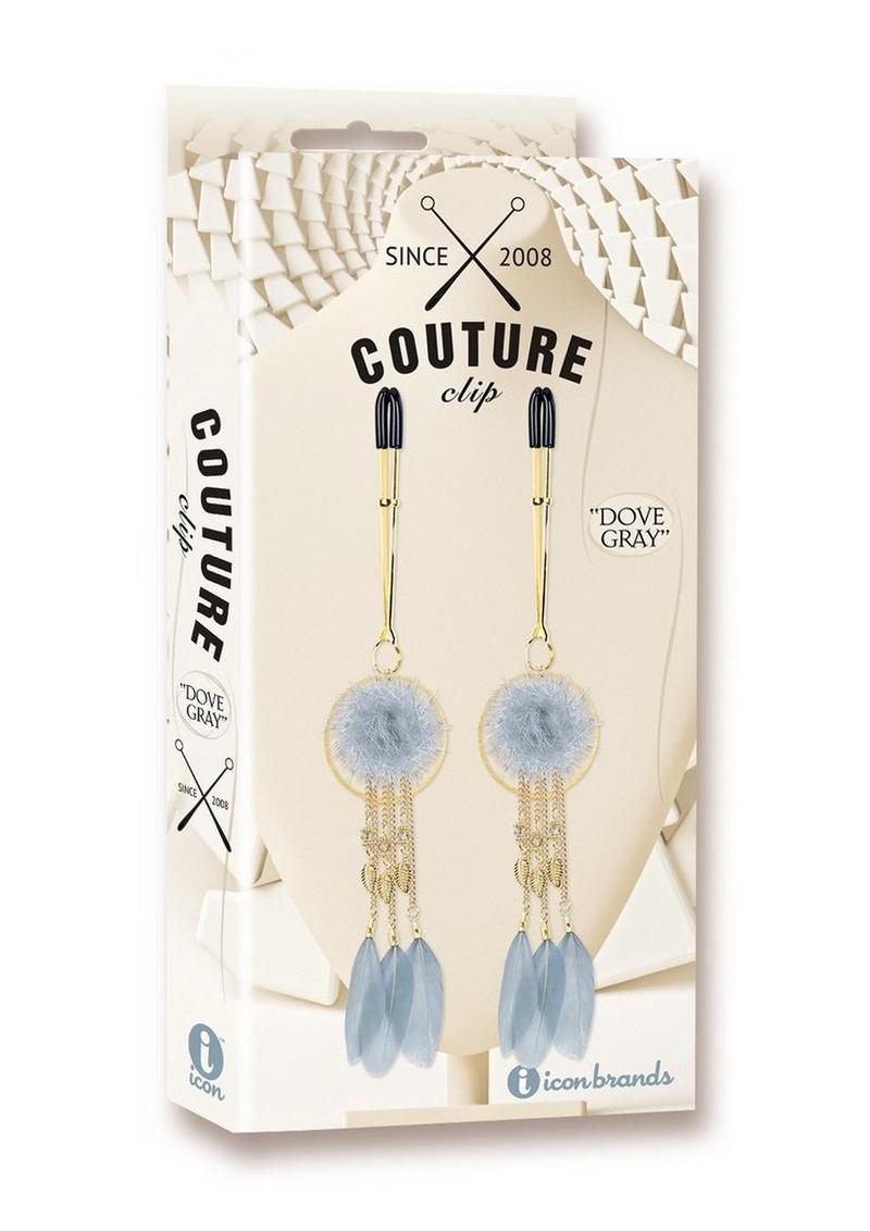 Couture Clip's Dove Gray Nipple Clamp - Gold - One Size Dove Gray Luxury Nipple Clamps with gold chains and feathers by Studio Elysee. Keywords: luxury nipple clamps, dove gray nipple jewelry, Parisian nipple clamps, elegant nipple accessories, Studio Elysee clamps, adjustable nipple clamps, gold feather nipple clips, Couture Clips nipple clamps, lightweight nipple clamps, high-fashion kink accessories.