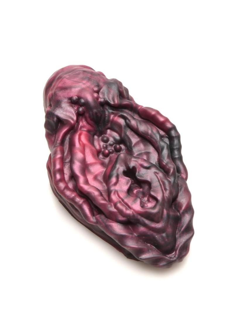 Squishy red and black alien vulva grinder with textured design for non-penetrative pleasure.
Xeno vulva, alien vulva grinder, non-penetrative pleasure, textured grinder, fantasy pleasure toy, red and black vulva, squishy silicone toy, body-safe silicone, phthalate-free grinder, erogenous zone toy, water-based lube friendly, alien roleplay toy