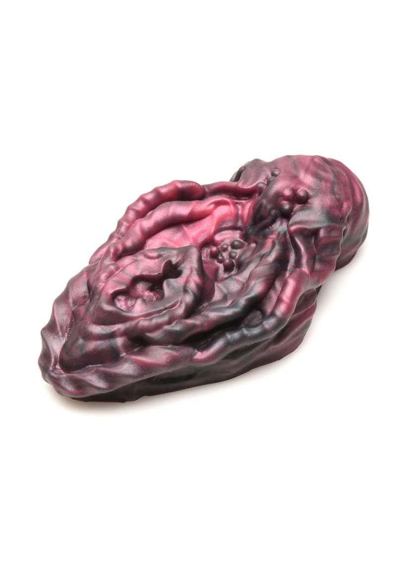 Squishy red and black alien vulva grinder with textured design for non-penetrative pleasure.
Xeno vulva, alien vulva grinder, non-penetrative pleasure, textured grinder, fantasy pleasure toy, red and black vulva, squishy silicone toy, body-safe silicone, phthalate-free grinder, erogenous zone toy, water-based lube friendly, alien roleplay toy