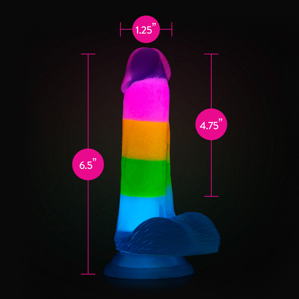 A vibrant glow-in-the-dark rainbow dildo with dual-density silicone, a suction cup base, and lifelike details. Perfect for hands-free or strap-on play. Keywords: Neo Elite Rainbow Rave, glow-in-the-dark dildo, rainbow dildo, Sensa Feel, dual-density silicone, Purio silicone, harness-compatible dildo, suction cup dildo, body-safe silicone, lifelike dildo, beginner-friendly toy