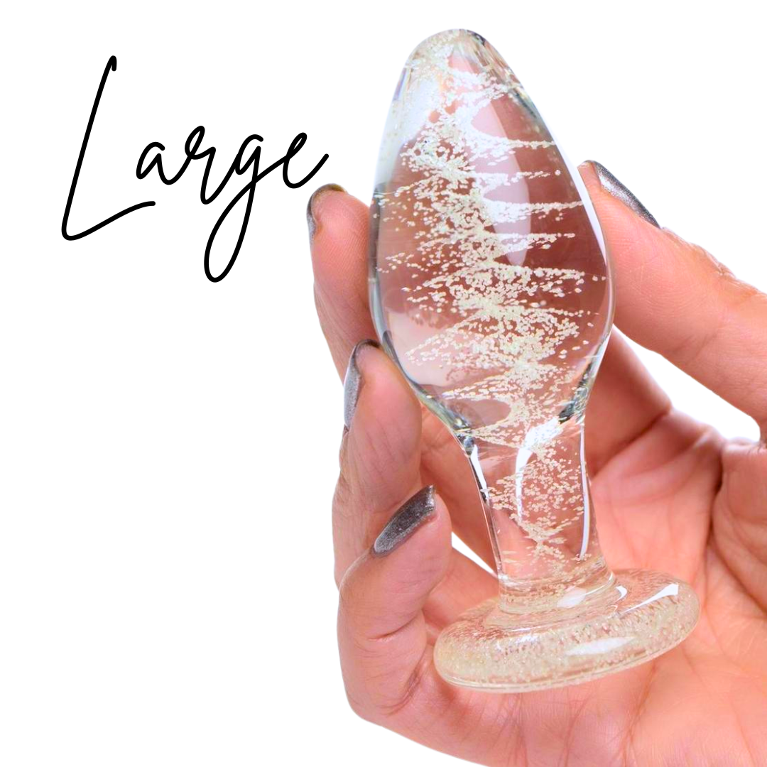 Glow-in-the-dark glass anal plug with swirl pattern, body-safe material, and temperature play compatibility.
glow-in-the-dark anal plug, borosilicate glass plug, Booty Sparks glass plug, temperature play anal toy, glowing butt plug, body-safe anal plug, small anal plug, medium anal plug, large anal plug, luminous glass toy, St. Patrick's Day anal plug
