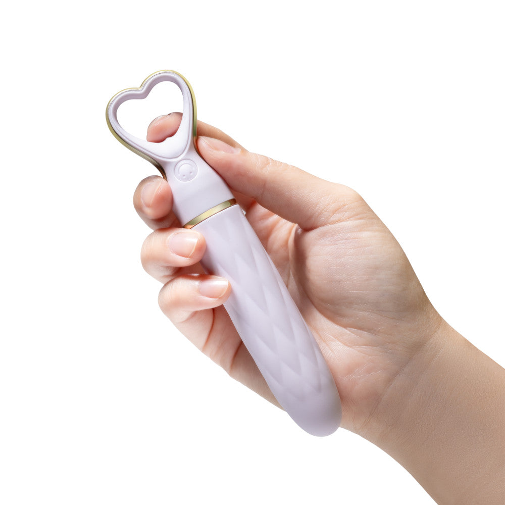 A chic, heart-shaped vibrator with 10 vibration modes, a tapered tip, and a gold-accented handle. Made from soft silicone, it’s splashproof, USB rechargeable, and compact for travel.
Keywords: Delice vibrator, heart-shaped handle, chic vibrator, Puria silicone, UltraSilk finish, splashproof vibrator, USB rechargeable, travel-friendly vibrator, 10 vibration modes, compact vibrator, body-safe silicone, giftable vibrator