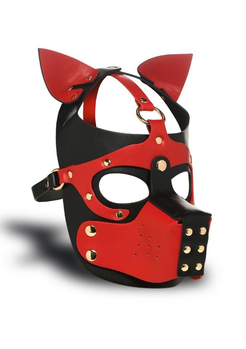 Red and black vegan leather puppy play hood with removable muzzle, upright ears, adjustable straps, and gold nickel-free hardware for roleplay or BDSM.