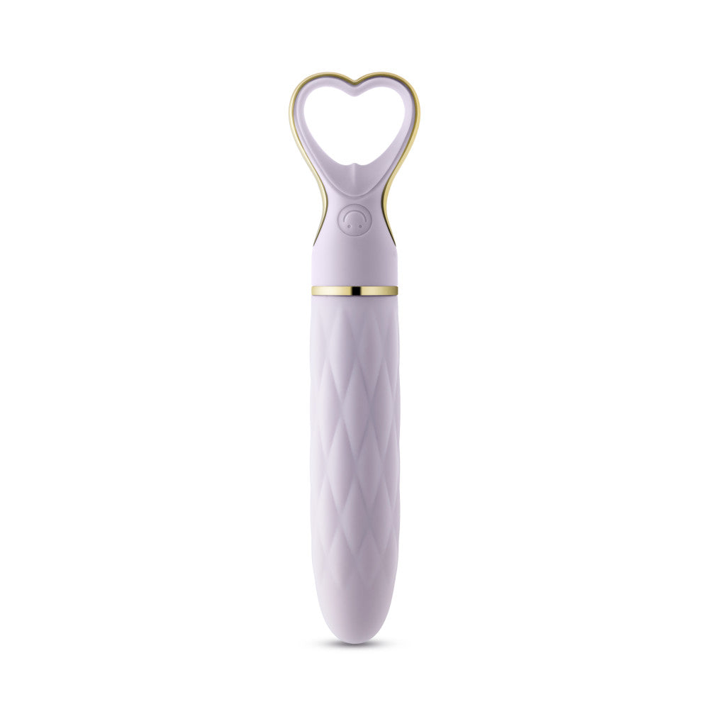 A chic, heart-shaped vibrator with 10 vibration modes, a tapered tip, and a gold-accented handle. Made from soft silicone, it’s splashproof, USB rechargeable, and compact for travel.
Keywords: Delice vibrator, heart-shaped handle, chic vibrator, Puria silicone, UltraSilk finish, splashproof vibrator, USB rechargeable, travel-friendly vibrator, 10 vibration modes, compact vibrator, body-safe silicone, giftable vibrator