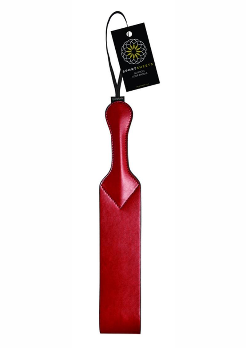 Sportsheets Saffron Loop Paddle in vegan leather with a crimson loop, wrist strap, and bold design for versatile impact play.