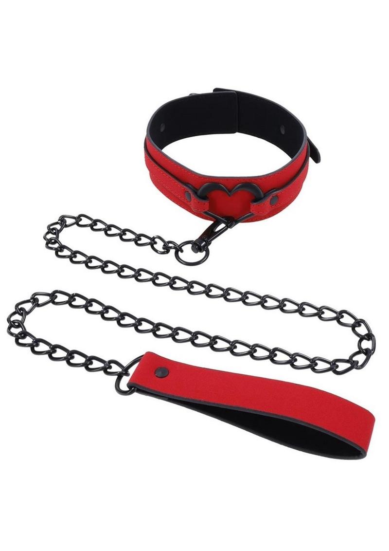 Amor Collar and Leash in red vegan leather with a silver heart embellishment, 36-inch chain leash, and adjustable buckle clasp.
Amor Collar and Leash, vegan leather collar, red collar and leash, BDSM accessories, silver heart collar, adjustable bondage collar, elegant leash set, vegan BDSM gear, passion collar and leash, intimate play accessories.