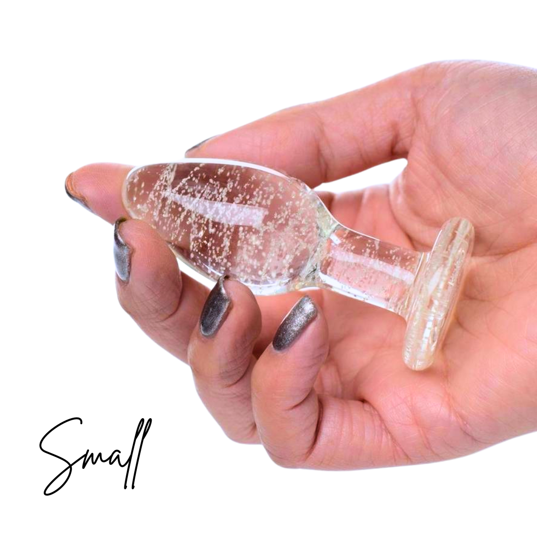 Glow-in-the-dark glass anal plug with swirl pattern, body-safe material, and temperature play compatibility.
glow-in-the-dark anal plug, borosilicate glass plug, Booty Sparks glass plug, temperature play anal toy, glowing butt plug, body-safe anal plug, small anal plug, medium anal plug, large anal plug, luminous glass toy, St. Patrick's Day anal plug