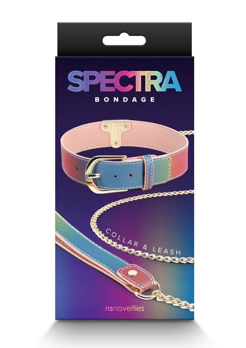 Rainbow BDSM collar and leash set with adjustable faux leather collar and gold chain leash.
Keywords: Spectra Bondage Collar and Leash Rainbow, rainbow BDSM collar and leash, colorful bondage set, faux leather collar, NS Novelties leash set, adjustable BDSM collar, stylish bondage accessories, vibrant fetish restraints, kinky collar and leash set, rainbow bondage gear.