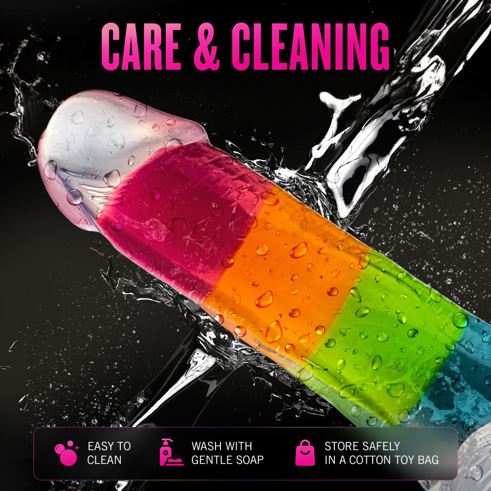A vibrant glow-in-the-dark rainbow dildo with dual-density silicone, a suction cup base, and lifelike details. Perfect for hands-free or strap-on play. Keywords: Neo Elite Rainbow Rave, glow-in-the-dark dildo, rainbow dildo, Sensa Feel, dual-density silicone, Purio silicone, harness-compatible dildo, suction cup dildo, body-safe silicone, lifelike dildo, beginner-friendly toy