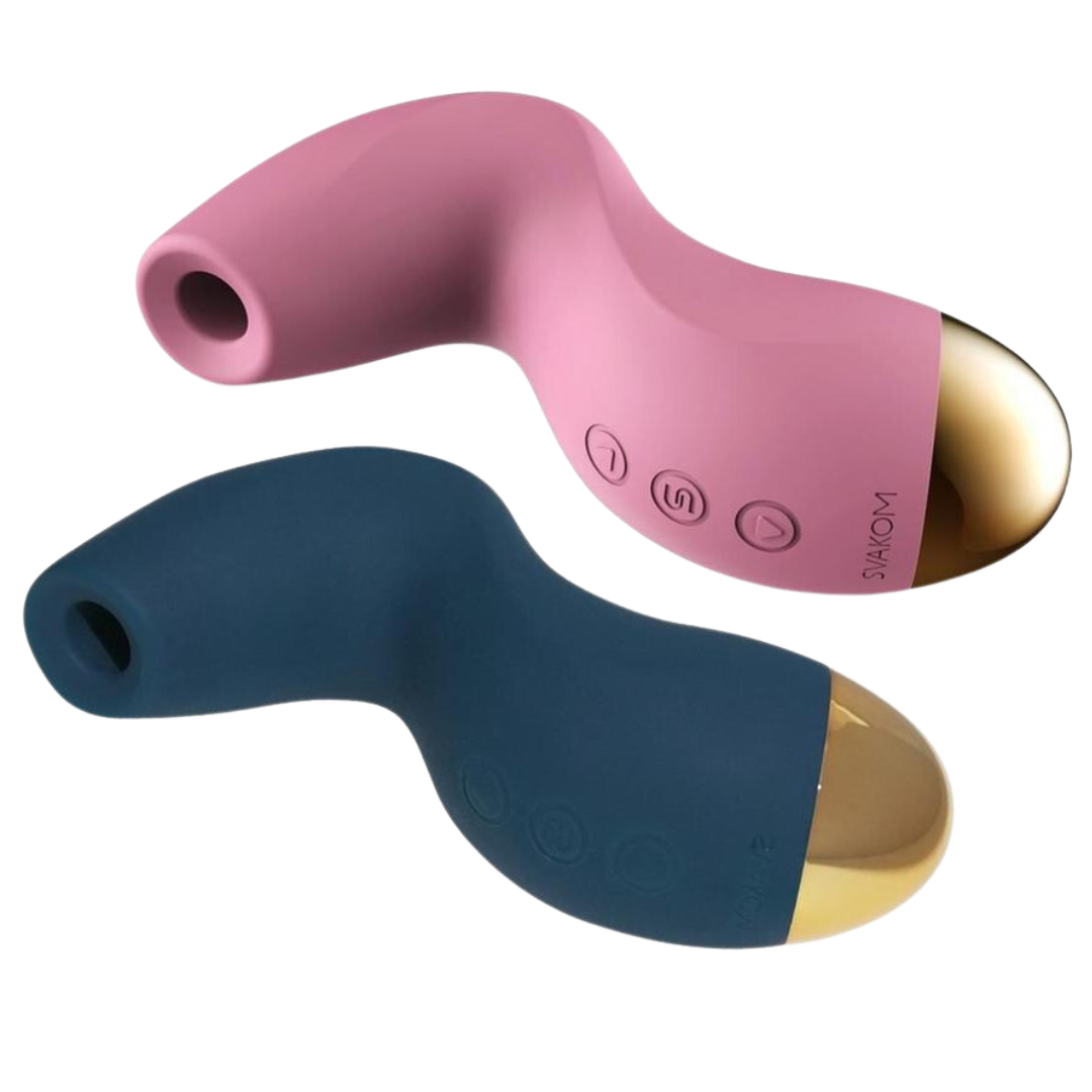 Two SVAKOM Pulse Pure clitoral stimulators in pink and navy blue, featuring a sleek, curvaceous design with a gold accent base and ergonomic shape for easy handling.