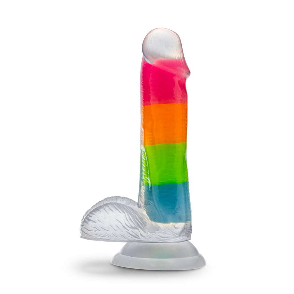 A vibrant glow-in-the-dark rainbow dildo with dual-density silicone, a suction cup base, and lifelike details. Perfect for hands-free or strap-on play. Keywords: Neo Elite Rainbow Rave, glow-in-the-dark dildo, rainbow dildo, Sensa Feel, dual-density silicone, Purio silicone, harness-compatible dildo, suction cup dildo, body-safe silicone, lifelike dildo, beginner-friendly toy