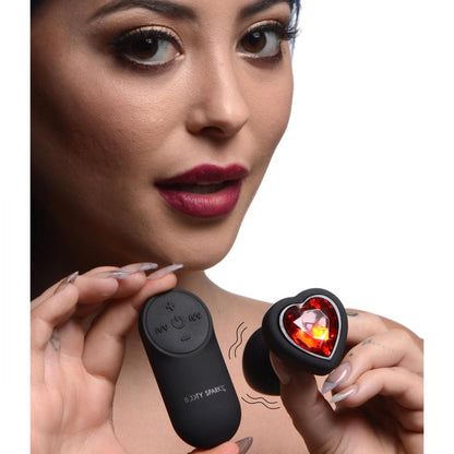 28X Silicone Vibrating Red Heart Anal Plug with remote control, featuring 4 speeds, 7 vibration patterns, body-safe silicone, and a red jeweled base.

vibrating anal plug, red heart anal plug, jeweled butt plug, vibrating butt plug with remote, silicone anal plug, rechargeable anal plug, heart-shaped anal plug, splashproof anal plug, remote-controlled anal toy, anal plug for beginners