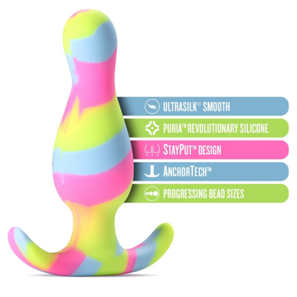 The Avant Kaleido Lime Butt Plug with feature labels, including Ultrasilk® smooth finish, Puria™ silicone, StayPut™ design, AnchorTech™ base, and progressing bead sizes for added sensation.