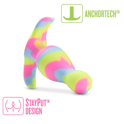 The Avant Kaleido Lime Butt Plug displayed on its side, highlighting its colorful swirls, AnchorTech™ base, and StayPut™ design for secure use.
