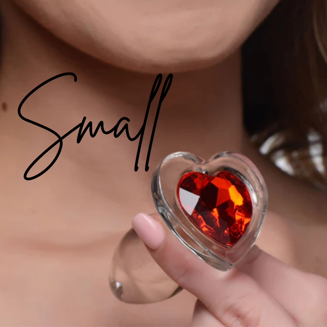Clear glass anal plug with a red heart-shaped base, available in Small, Medium, or Large, designed for temperature play and smooth, comfortable insertion.

Booty Sparks red heart plug, glass anal plug, heart-shaped anal plug, temperature play anal plug, small glass anal plug, medium glass anal plug, large glass anal plug, red heart butt plug, hypoallergenic anal toy, romantic anal toy