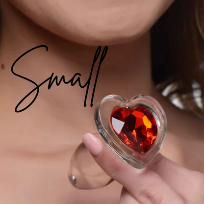 Clear glass anal plug with a red heart-shaped base, available in Small, Medium, or Large, designed for temperature play and smooth, comfortable insertion.

Booty Sparks red heart plug, glass anal plug, heart-shaped anal plug, temperature play anal plug, small glass anal plug, medium glass anal plug, large glass anal plug, red heart butt plug, hypoallergenic anal toy, romantic anal toy