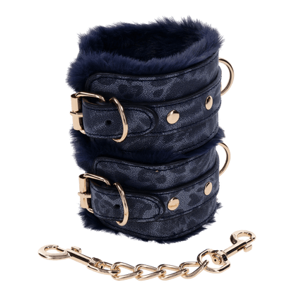 Cougar Fur Handcuffs with soft blue faux fur lining, gold-plated hardware, and adjustable buckle cuffs for elegant bondage play.
