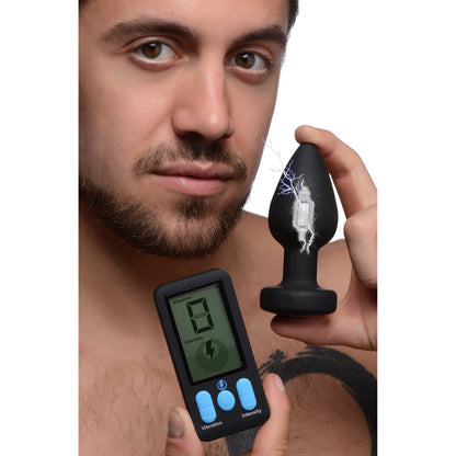 E-Stim Pro Silicone Vibrating Anal Plug with remote control, 5 vibration functions, and electrostimulation modes.
E-Stim anal plug, vibrating anal plug, electrostimulation plug, Zeus electrosex plug, silicone anal plug, rechargeable anal plug, anal toy with remote, vibrating and shocking anal plug, body-safe anal plug, dual sensation anal toy, electroplay anal plug.