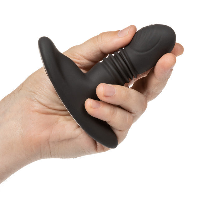 Eclipse Thrusting Rotator Probe Silicone Rechargeable Vibrating Butt Plug with Remote Control in a hand