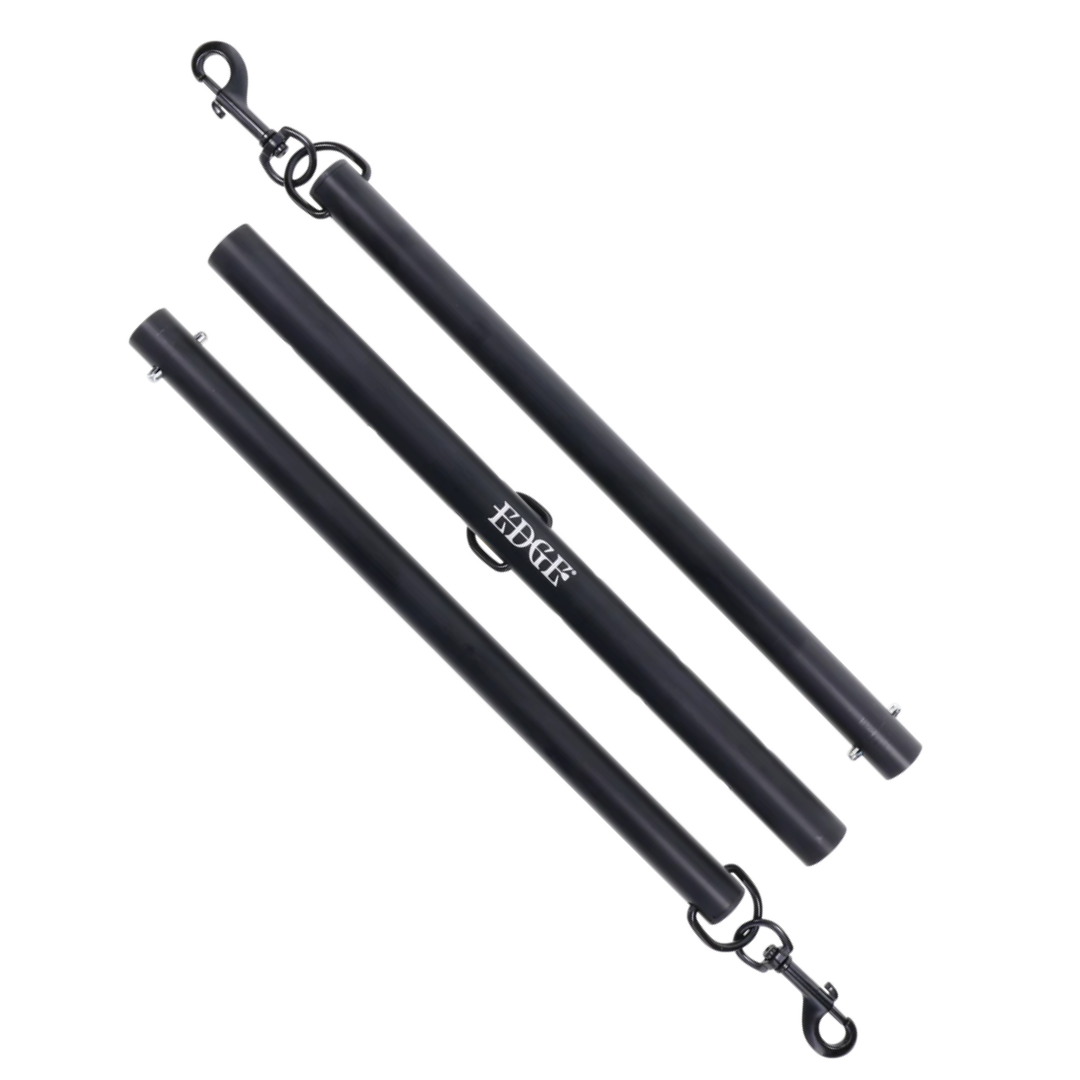 Adjustable aluminum spreader bar with nickel-free hardware, expands 28.5"–37". Includes clips for cuffs, middle attachment, and travel-friendly design.