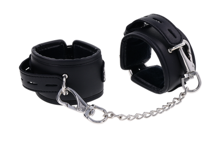 Edge® Handcuffs with padded black design, adjustable buckle closure, and removable metal tether for comfortable and secure BDSM play.