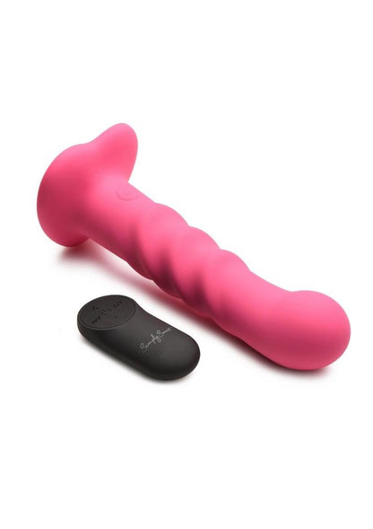 Enhance your playtime with the Simply Sweet Ribbed Dildo, featuring three textured ribs, 3 speeds and 7 patterns of vibration, and a remote control for effortless pleasure. Pink ribbed silicone dildo with vibrations, remote-controlled, harness-compatible suction base, waterproof, body-safe, phthalate-free. Keywords: pink silicone vibrating dildo, ribbed silicone dildo, G-spot vibrator, P-spot vibrator, harness-compatible dildo, suction cup dildo, waterproof vibrating dildo, remote-controlled sex toy, rechar