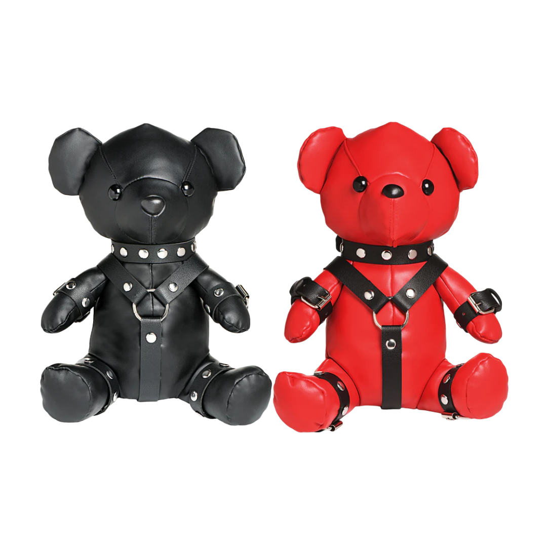 Teddy bear in a detailed vegan leather gimp outfit, available in black or red, featuring nickel-free metal accents for a kinky and playful look.

