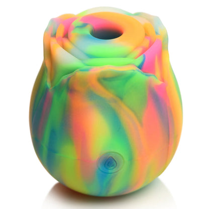 Glow-in-the-dark rainbow rose clit stimulator with suction patterns, body-safe silicone, and USB rechargeable design for nighttime pleasure.

