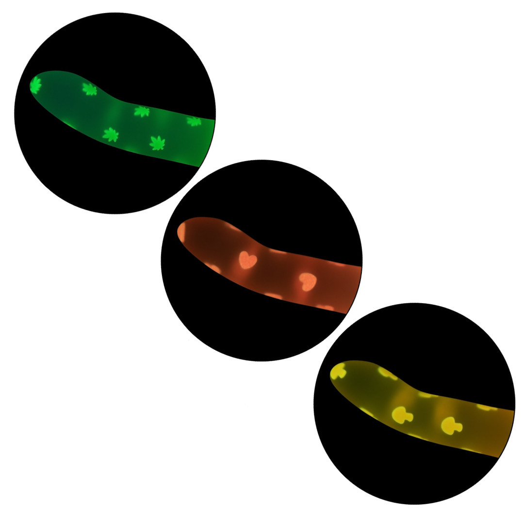 Image of Glow Stick Dildo available in three designs: Pink Hearts, Green Cannabis, and Orange Mushroom, made from body-safe silicone with glow-in-the-dark patterns and a suction cup base.

