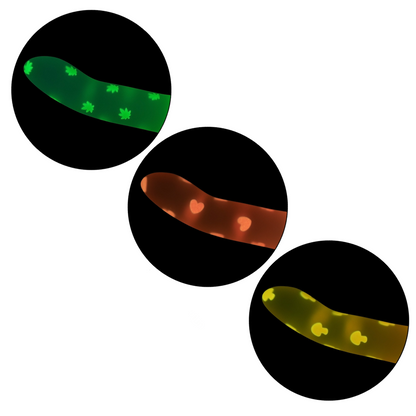 Image of Glow Stick Dildo available in three designs: Pink Hearts, Green Cannabis, and Orange Mushroom, made from body-safe silicone with glow-in-the-dark patterns and a suction cup base.


