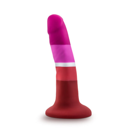 Lesbian pride-colored silicone dildo with a petite design, straight shaft, and suction base, made from smooth Purio™ silicone. Keywords: lesbian pride dildo, Avant dildo, petite dildo, beginner-friendly dildo, suction cup dildo, harness-compatible dildo, body-safe silicone dildo, colorful pride dildo, Purio silicone, artisan-crafted dildo.

